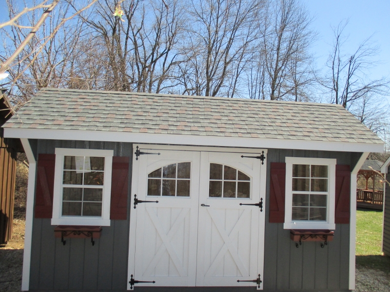 10x16 Quaker Garden Shed, Dark Gray siding, White trim, Williamsburg Slate roof, OPTIONAL Carriage Doors, Flower Boxes W/Holders, Garden Vents, list price $3,995, DISPLAY MODEL $3,795 Chester Springs
